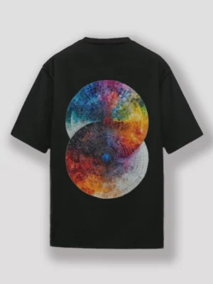 Back view of the black oversized t-shirt featuring colorful dual mosaic wheel design. Made from 240 GSM premium cotton with unisex streetwear fit.