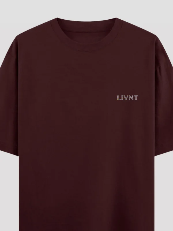 Maroon oversized t-shirt by LIVNT Originals with small multicolor logo on chest
