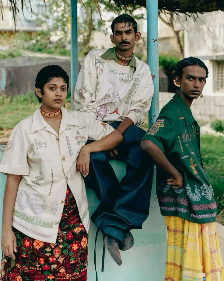 Models showcasing LIVNT's Kasuti collection of Indian streetwear, featuring traditional on modern apparel.