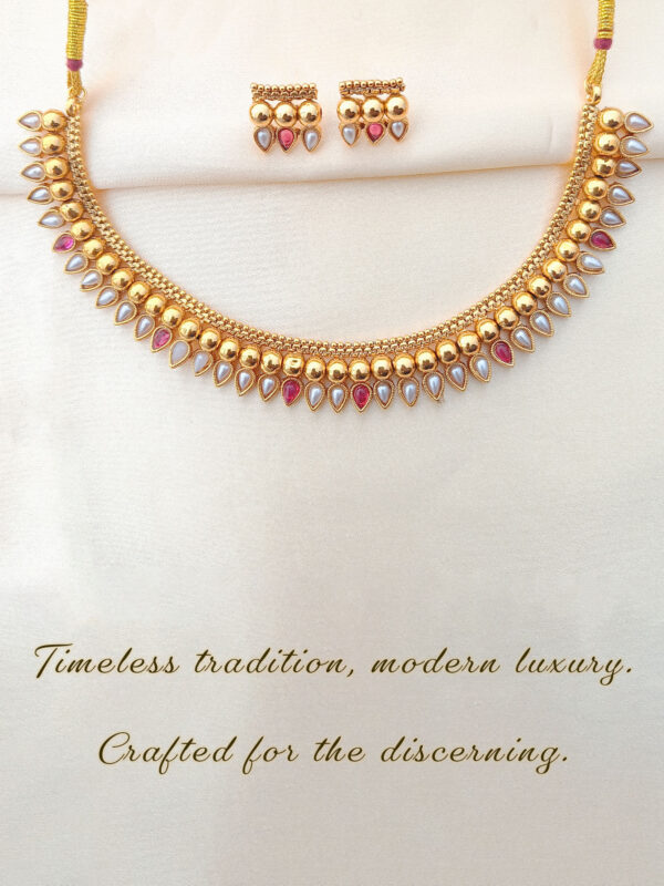 Promotional poster for LIVNT Ruby & Pearl Heritage Necklace with text “Timeless tradition, modern luxury. Crafted for the discerning.” on textured beige background