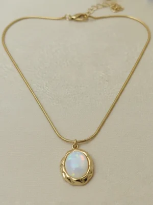 The Pebble Anti-Tarnish Necklace with its gold snake chain angled on a clean white background.