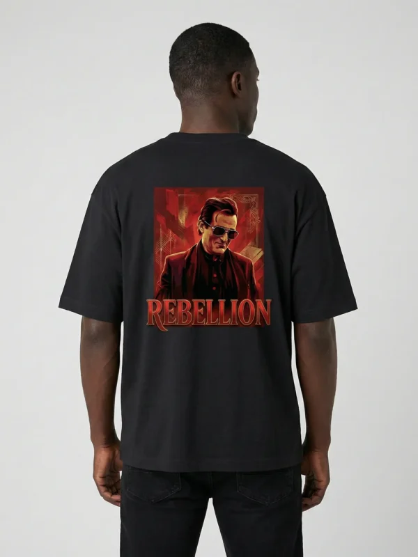 Man wearing Akshaye Khanna Dhurandhar inspired rebellion oversized black t-shirt with back print artwork made from 240 GSM cotton