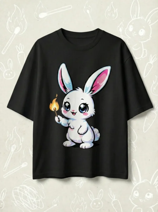 Black oversized t-shirt featuring cute anime bunny holding a lit matchstick graphic art flat lay.